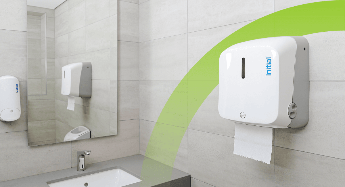 Dispensador de toalhas de papel de mãos sustentável numa casa de banho moderna, promovendo eficiência, redução de desperdício e menor impacto ambiental.