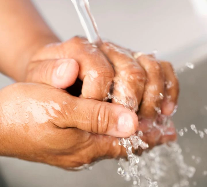 Washing hands with water