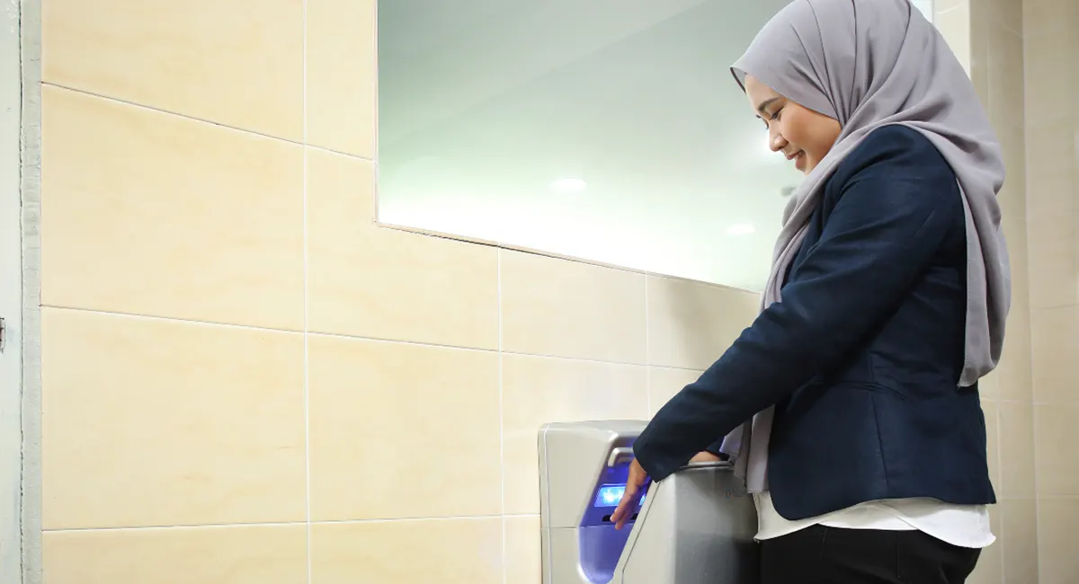 person washing their hands