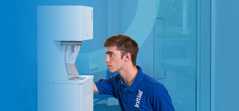 initial technician servicing hand sanitiser