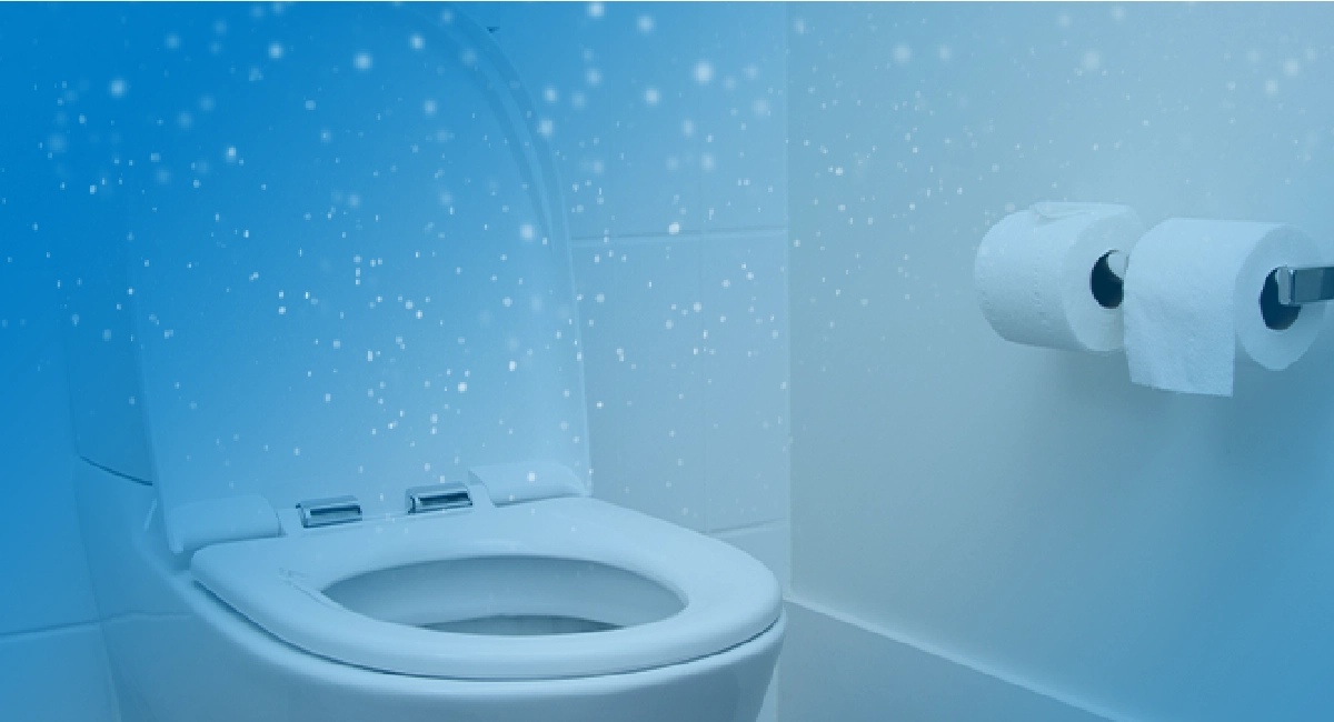 Particules dans l'air au-dessus de WC à l'abattant relevé