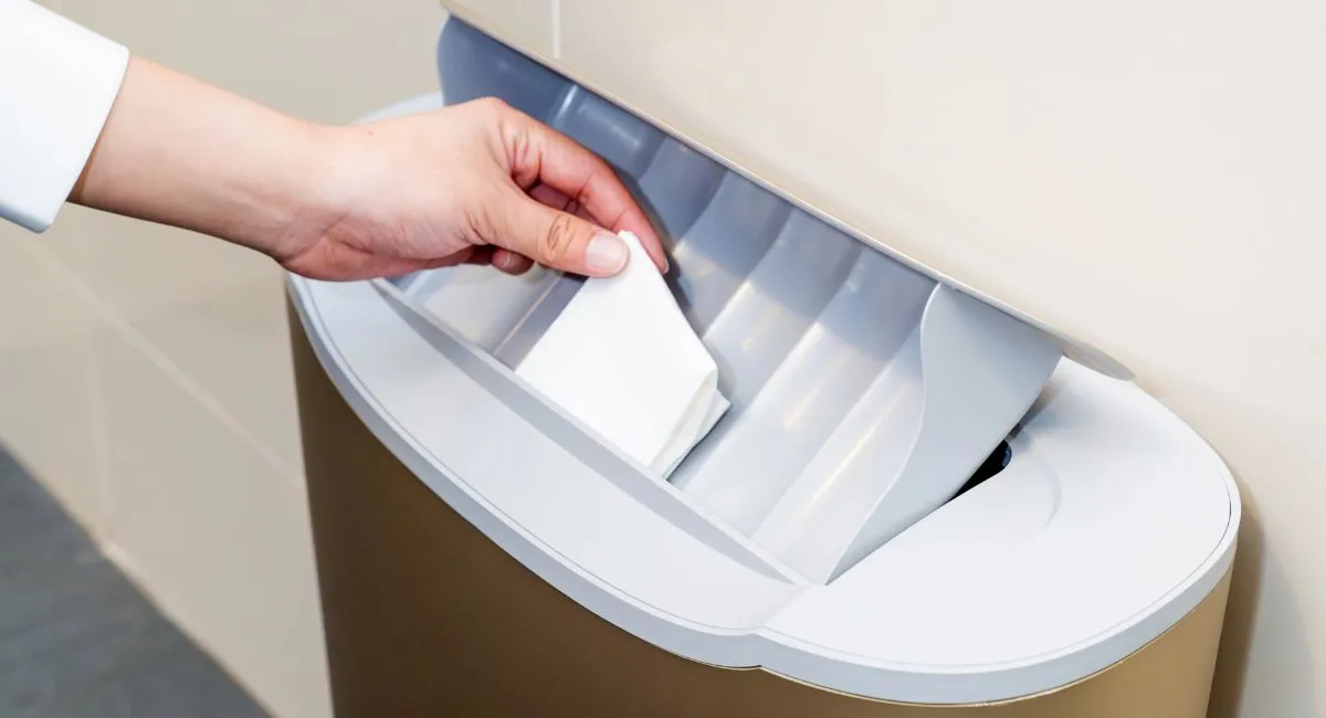 woman-using-auto-sanitary-bin-my