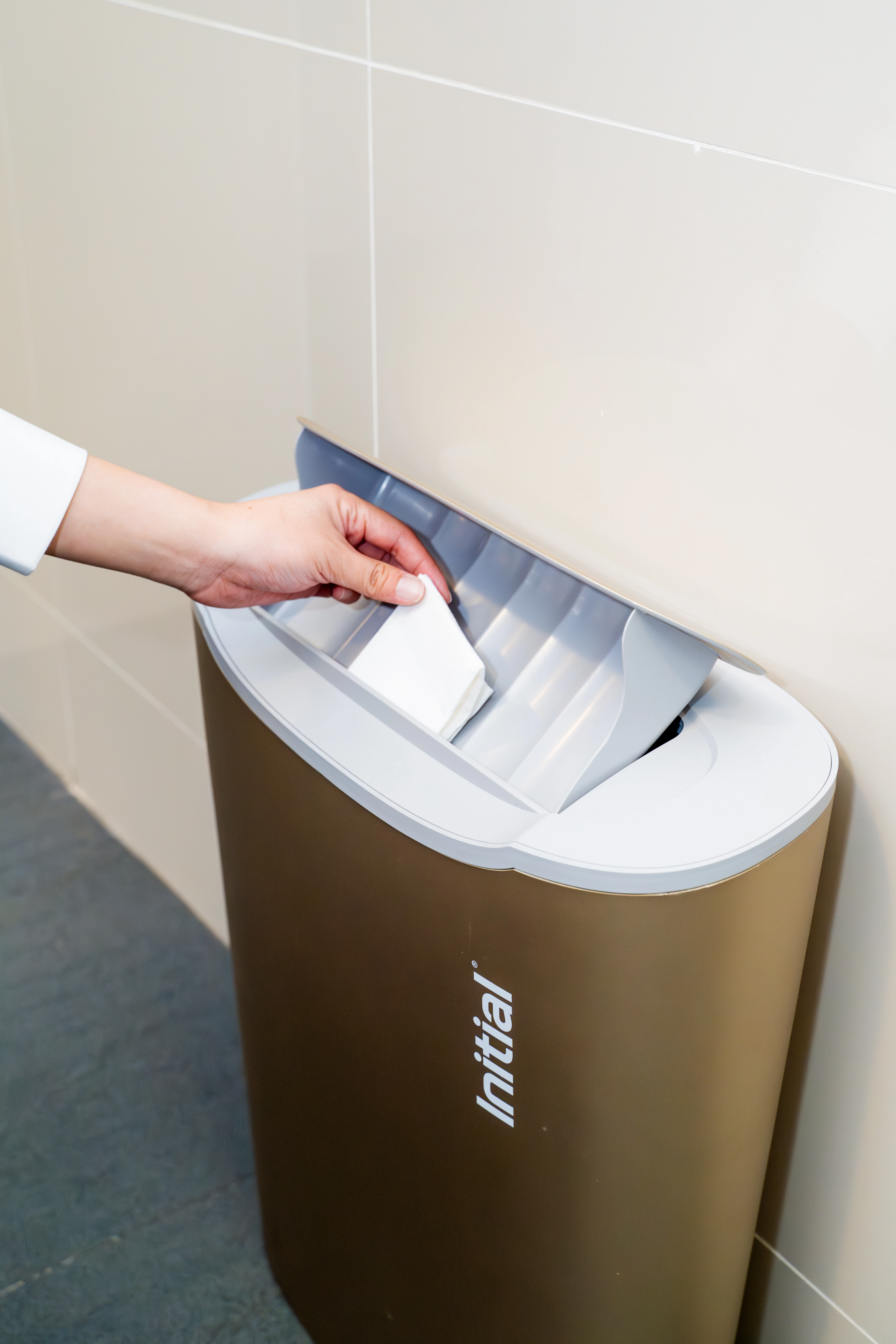 woman-using-auto-sanitary-bin-my