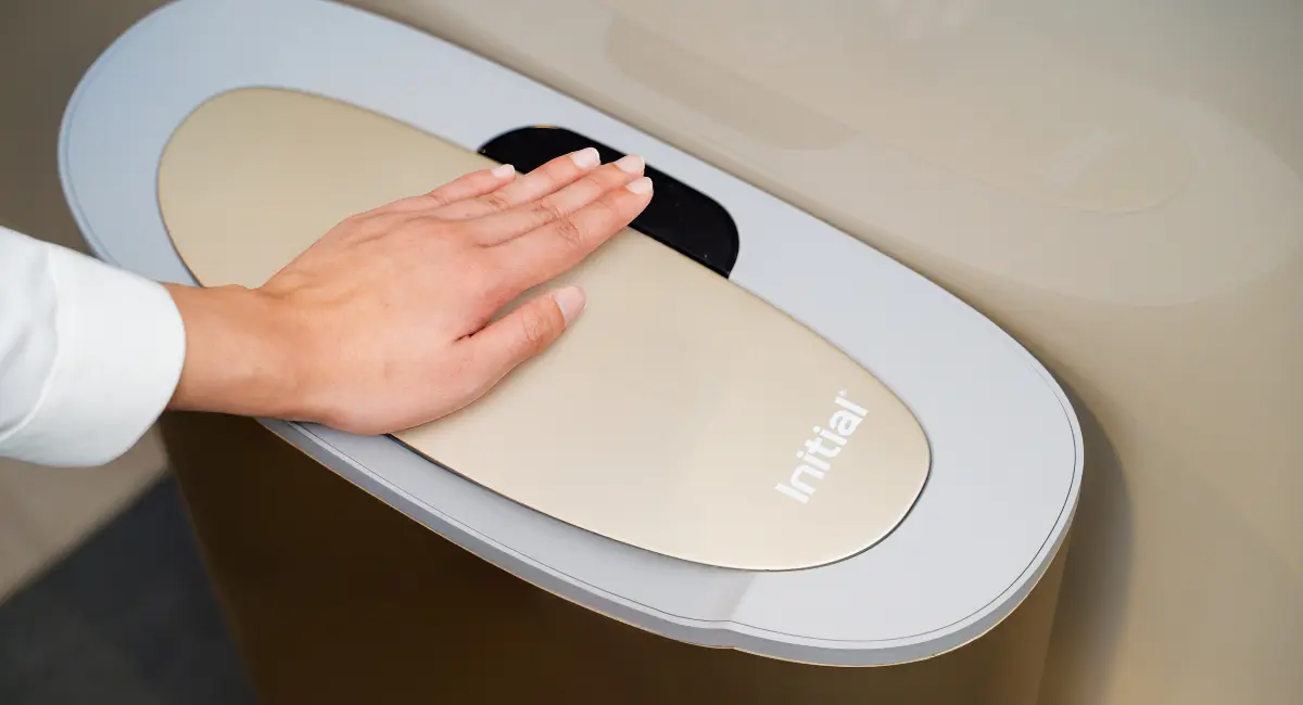 woman-using-auto-sanitary-bin-my