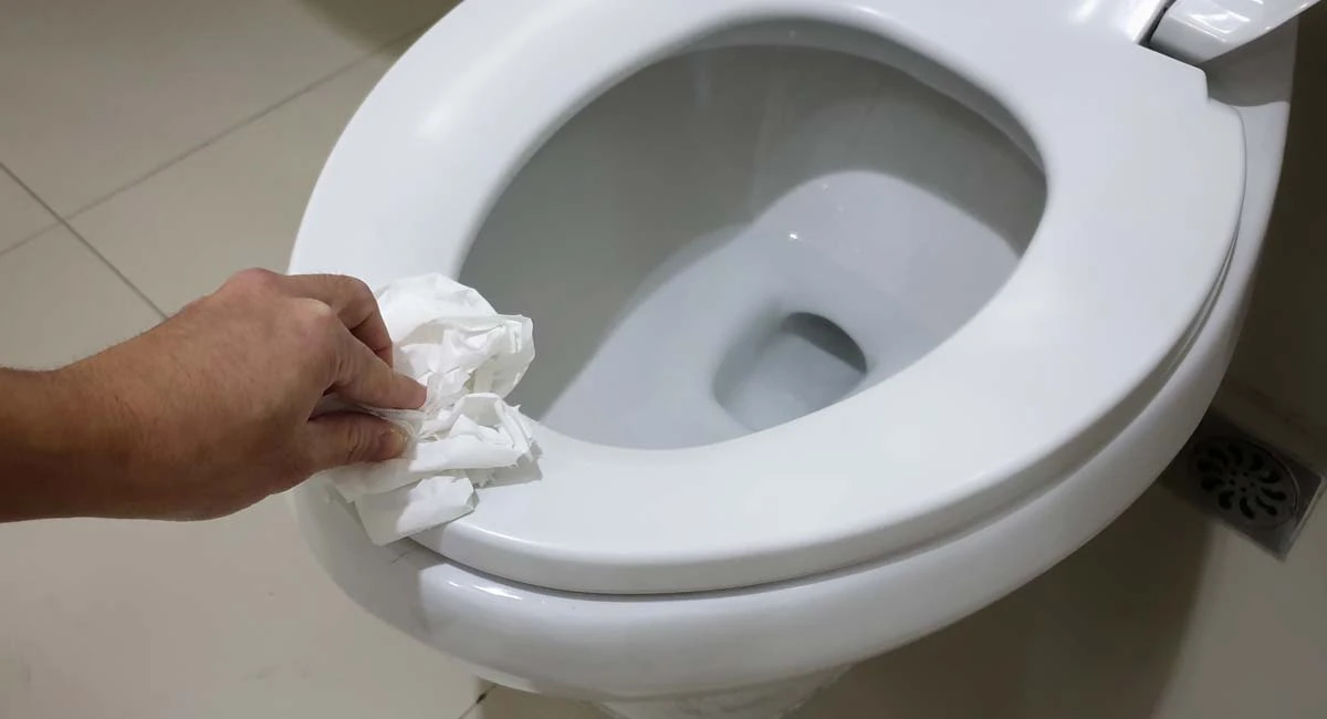 Cleaning after adding toilet seat sanitiser